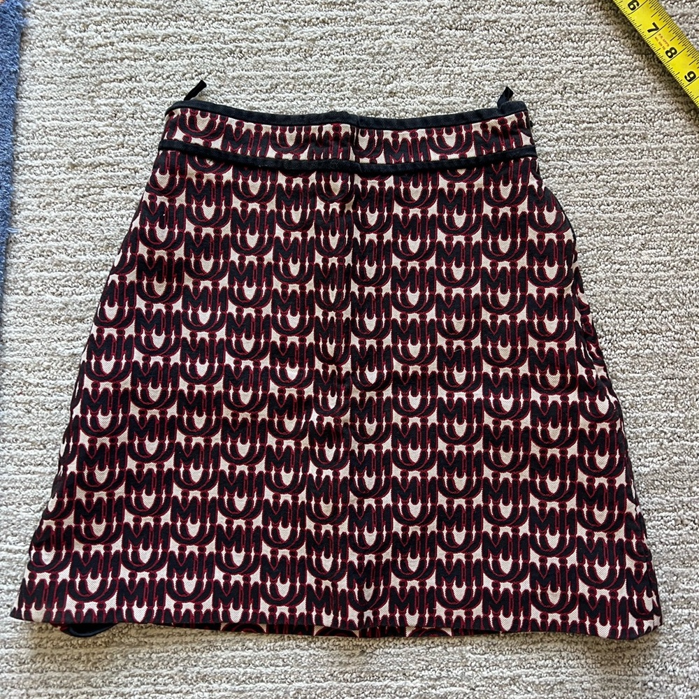 Miu Miu Burgundy, Black, and Cream Mini Skirt with All-Over Logo Pattern